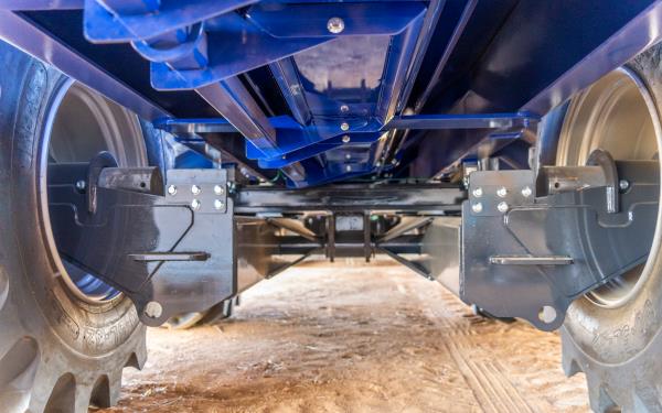 close up of undercarriage of chaser bin with adjustable CTF wheel centres 