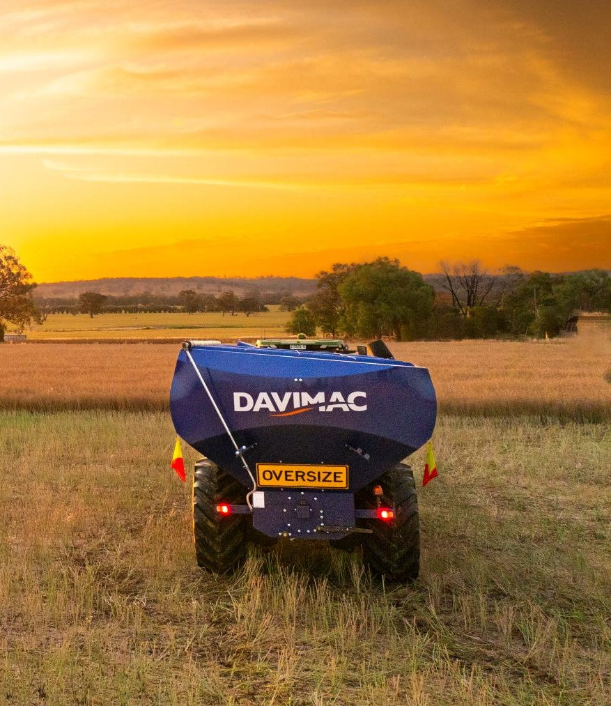 Davimac Chaser Bin Single Axle with sunset and hills in background