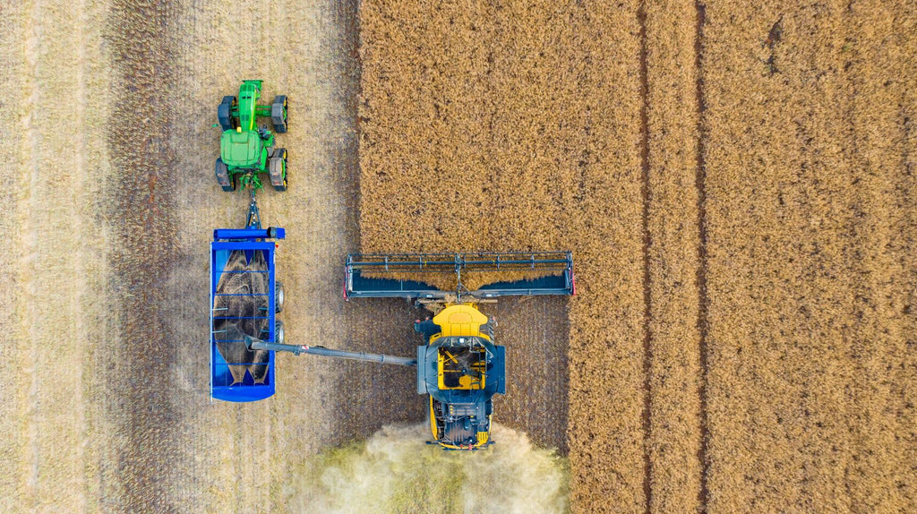 Aerial shot of Chaser bin, tractor and combine