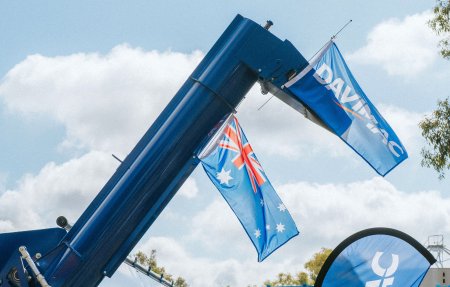 Aussie and Davimac Flags hanging off chaser bin auger