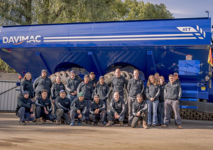 Davimac staff posing in front of 45t chaser bin