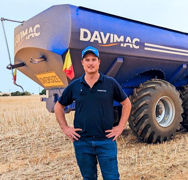 Davimac sales representative standing in front of a chaser bin